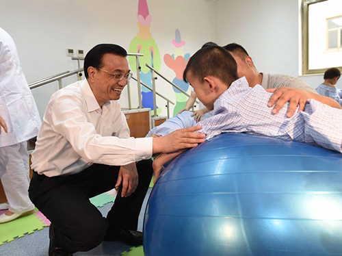 這三年，總理牽掛的殘疾人群體，迎來哪些暖政？