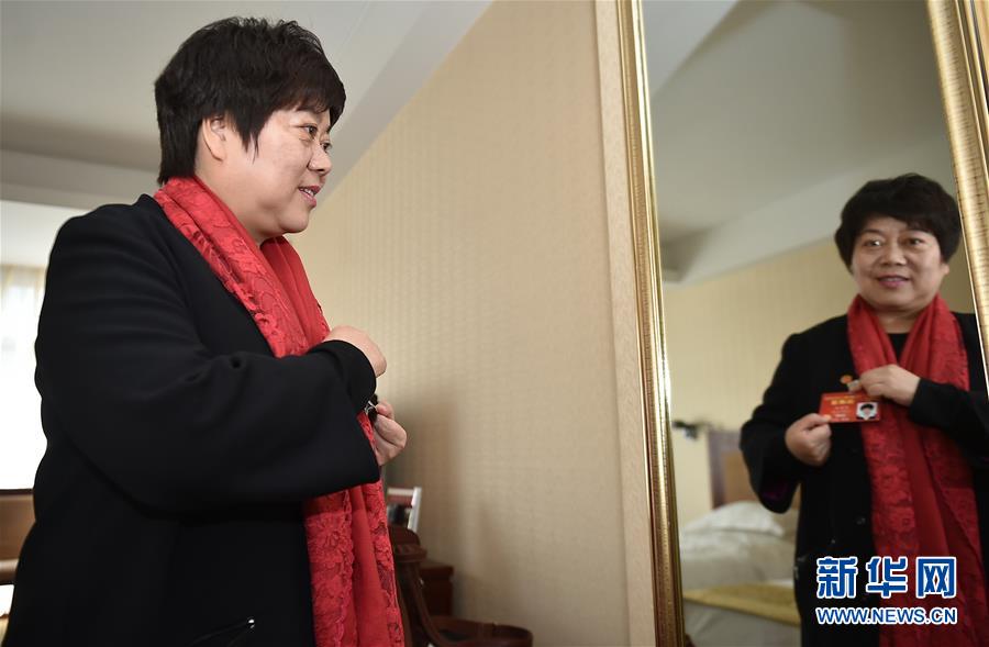 (兩會·圖片日記)(1)羅春桃代表的一天