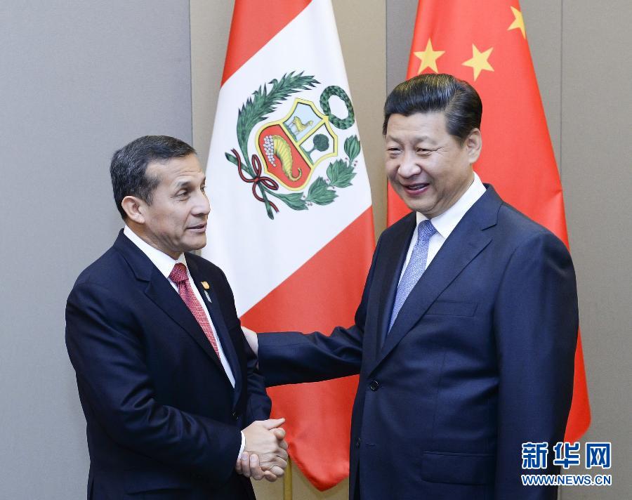 7月16日，國家主席習(xí)近平在巴西首都巴西利亞會見秘魯總統(tǒng)烏馬拉。新華社記者 劉建生 攝 