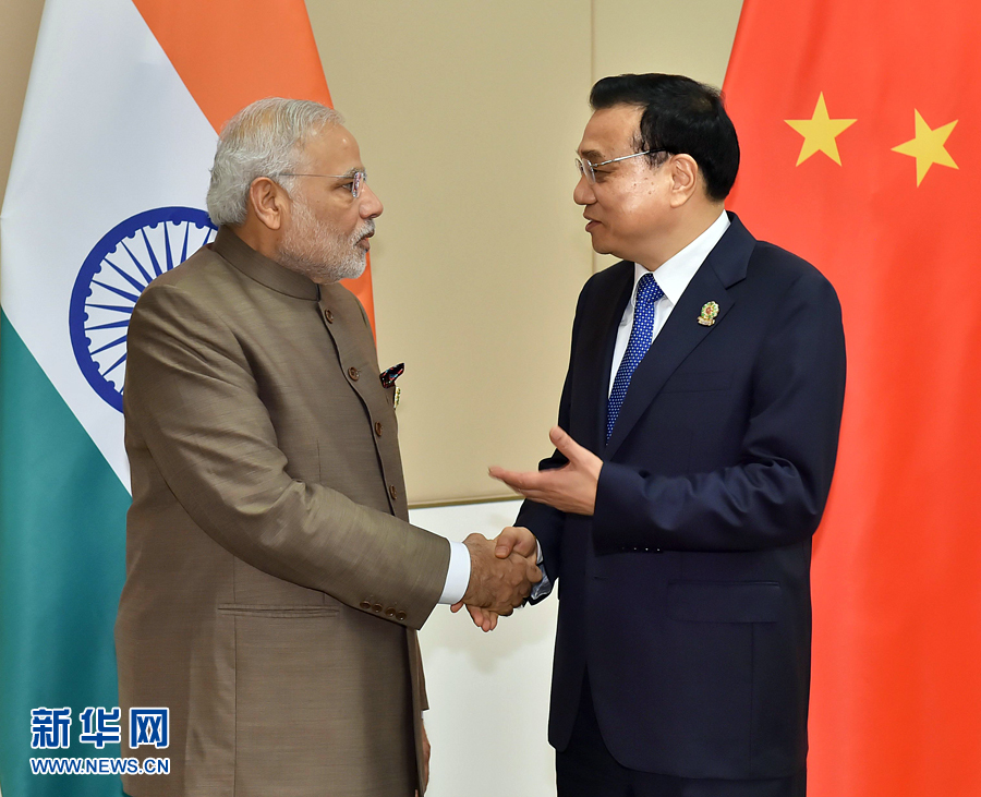 11月13日，中國國務院總理李克強在緬甸內比都會見印度總理莫迪。 新華社記者 李濤 攝