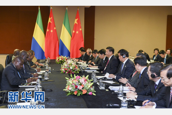 12月3日，國家主席習近平在約翰內斯堡會見加蓬總統(tǒng)邦戈。新華社記者 謝環(huán)馳 攝 