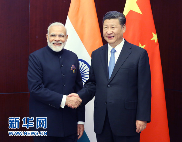 6月9日，國家主席習(xí)近平在阿斯塔納會見印度總理莫迪。 新華社記者姚大偉 攝